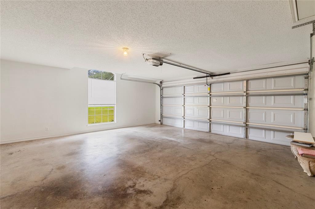 2917 Harlow Road Commerce, TX 75428 - Photo 29 of 40 a view of a garage with furniture