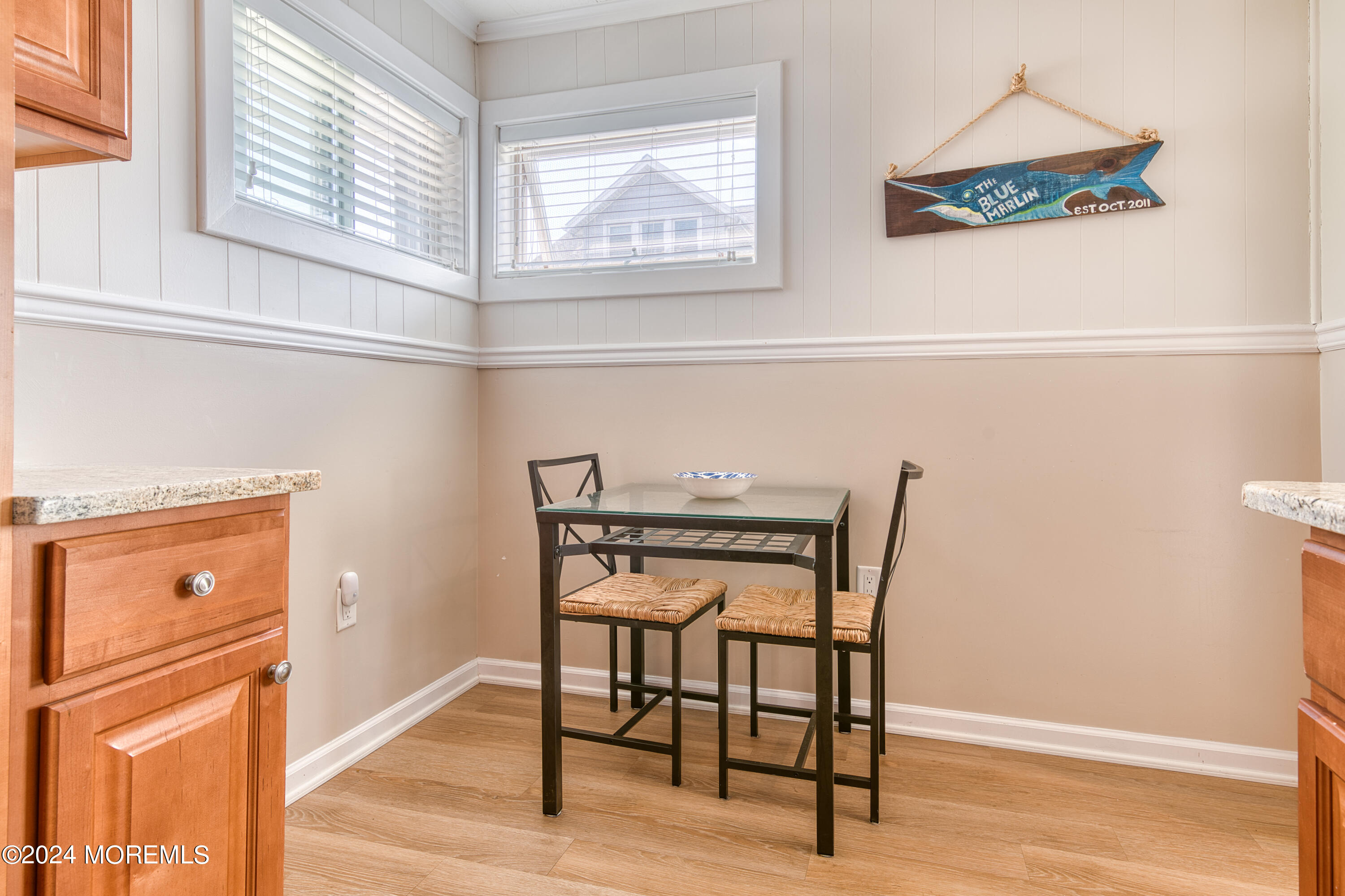 19 Via Ripa Way Sea Bright, NJ 07760 - Photo 17 of 41 a view of a hallway with wooden floor and a window
