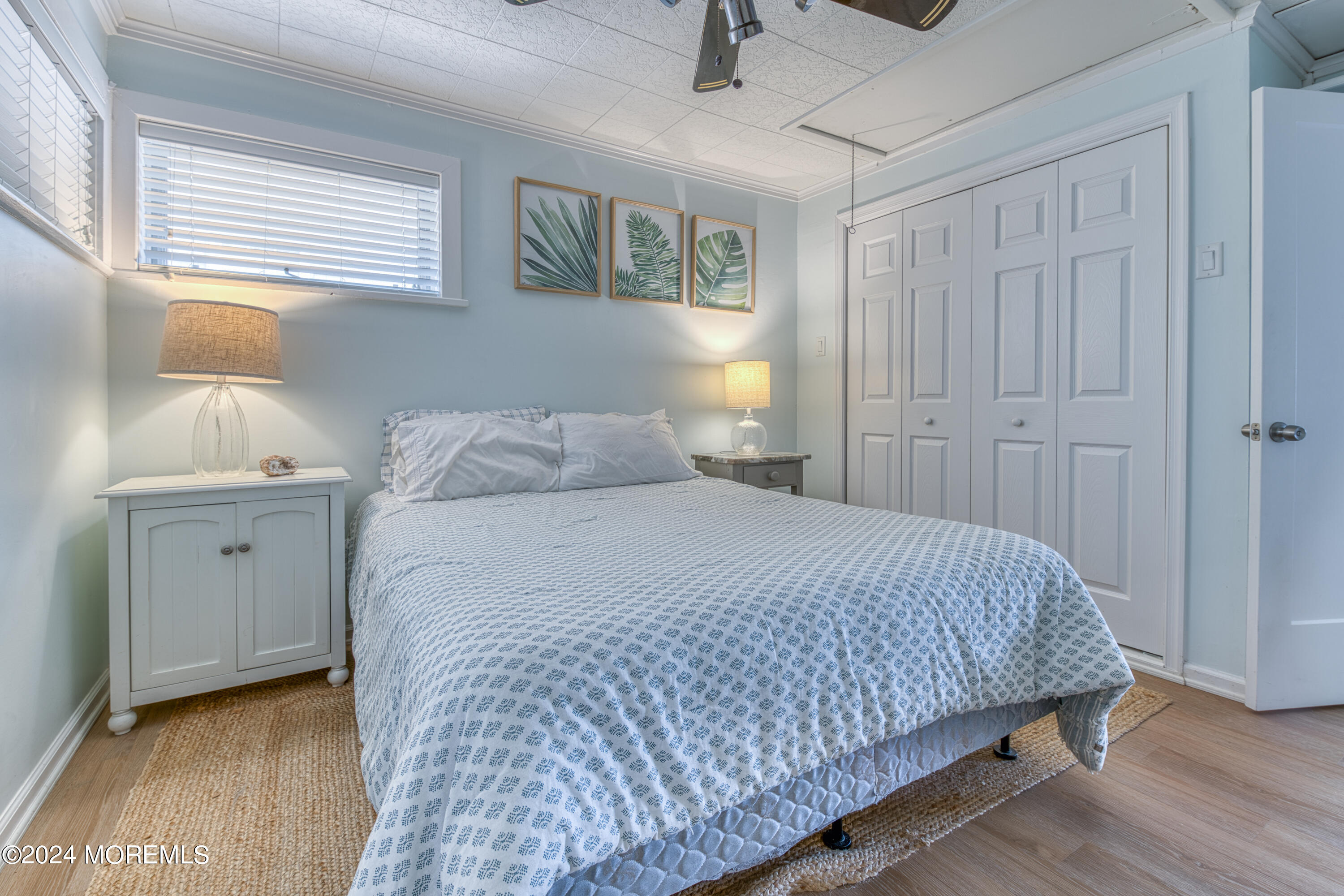 19 Via Ripa Way Sea Bright, NJ 07760 - Photo 18 of 41 a bedroom with a bed and a window