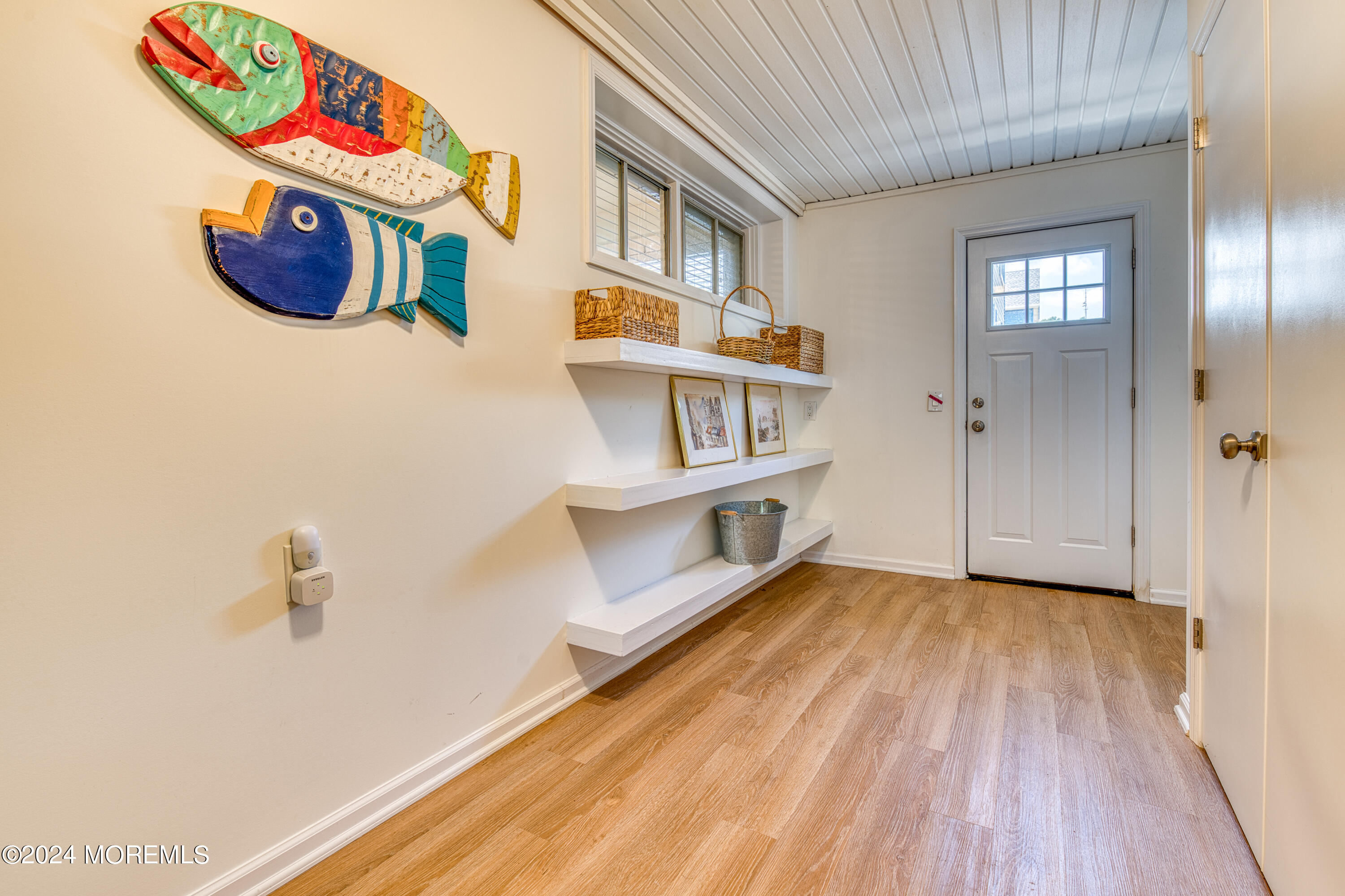 19 Via Ripa Way Sea Bright, NJ 07760 - Photo 20 of 41 a view of an entryway with wooden floor