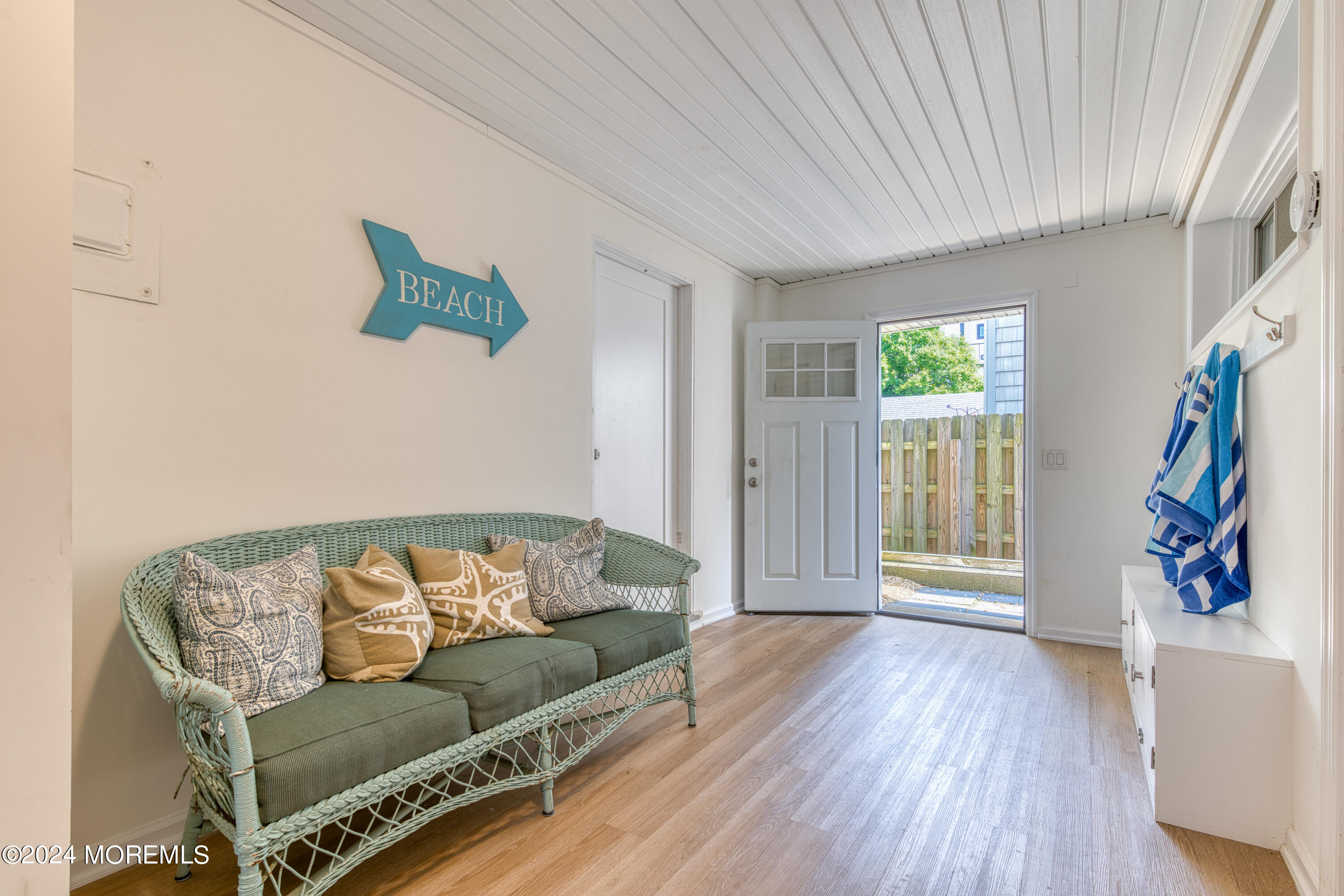 19 Via Ripa Way Sea Bright, NJ 07760 - Photo 22 of 41 a living room with furniture and a window