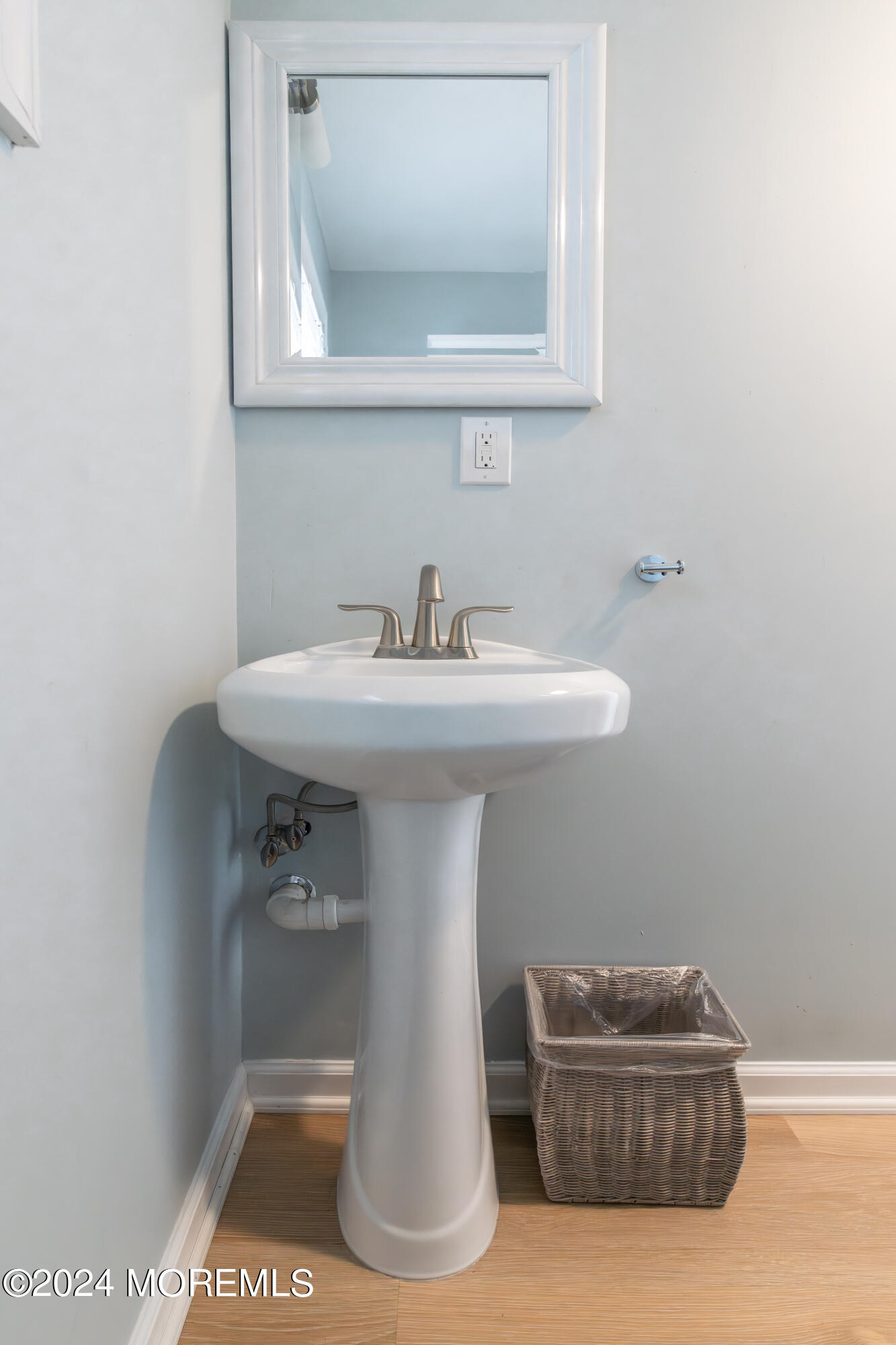 19 Via Ripa Way Sea Bright, NJ 07760 - Photo 27 of 41 a bathroom with a sink a mirror and bathtub