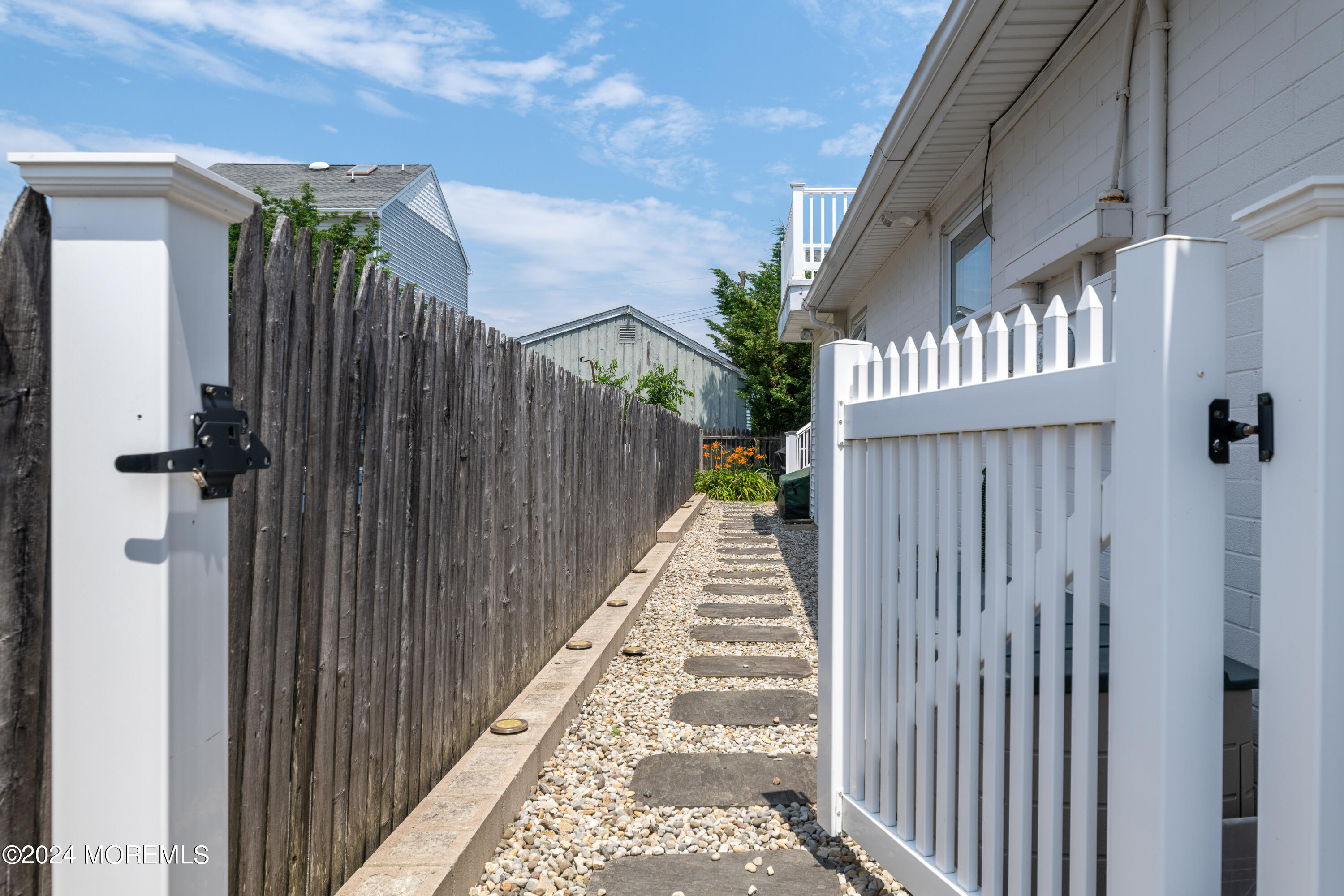 19 Via Ripa Way Sea Bright, NJ 07760 - Photo 33 of 41 a view of a house with a hallway