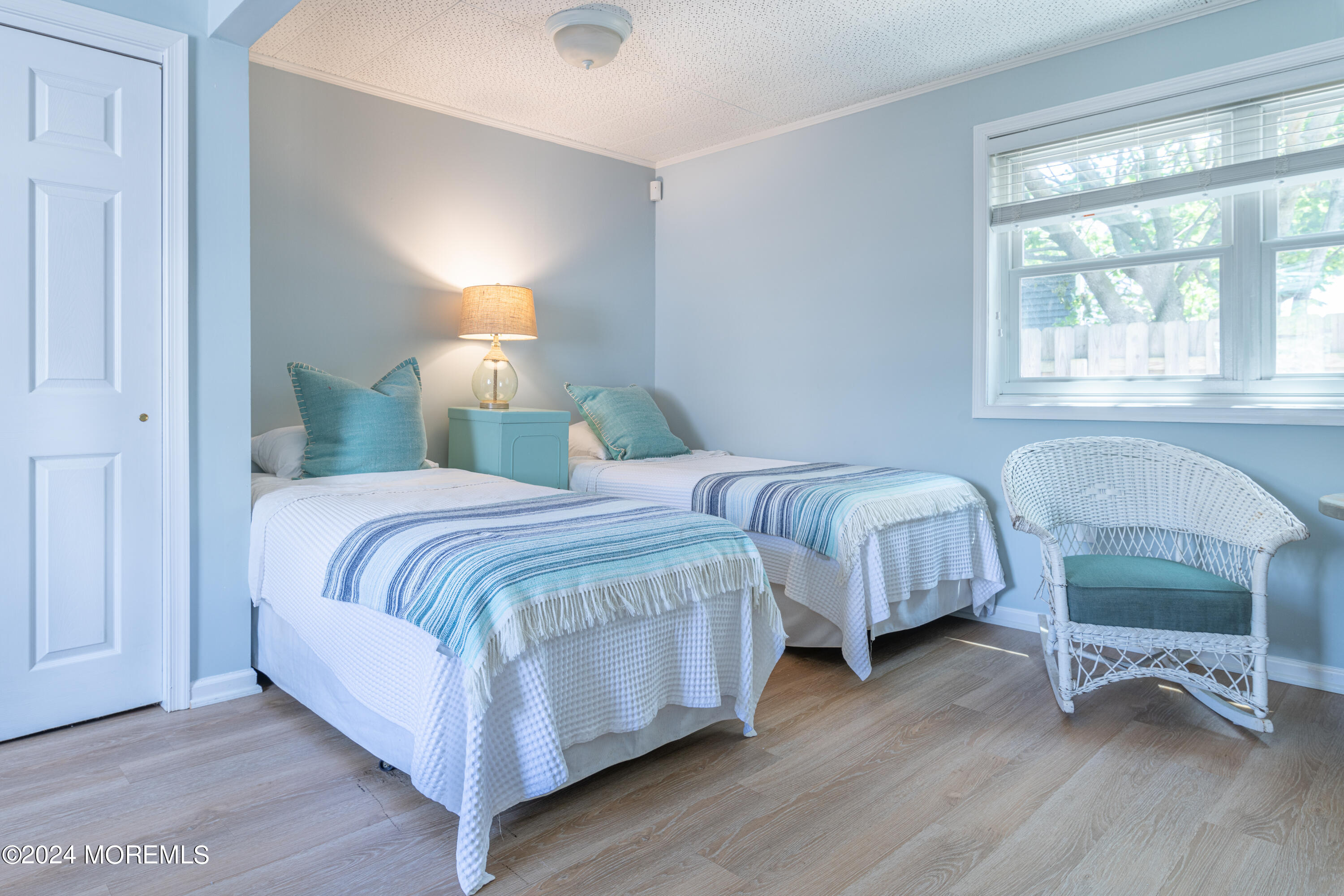 19 Via Ripa Way Sea Bright, NJ 07760 - Photo 8 of 41 a bedroom with two beds and a chair