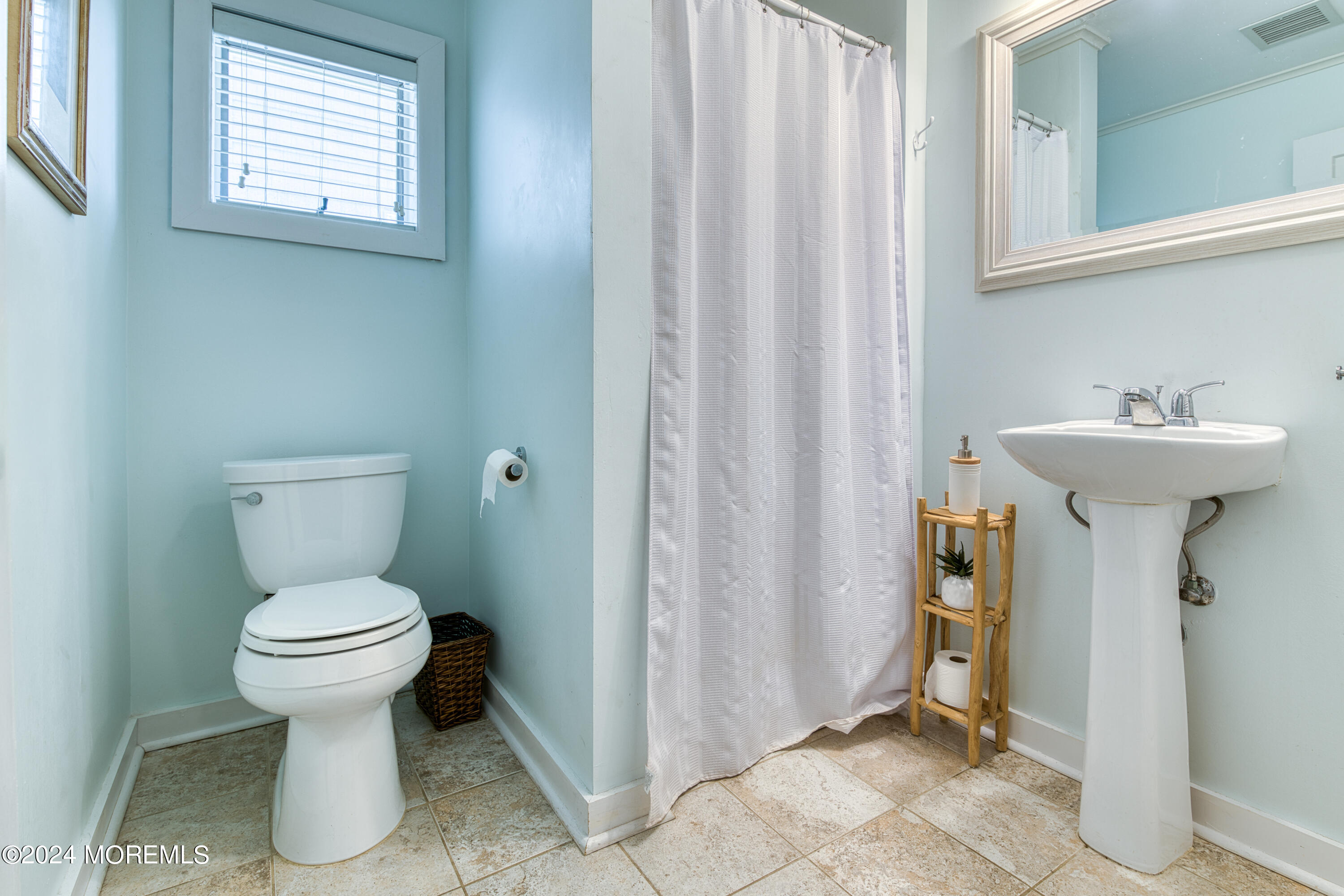 19 Via Ripa Way Sea Bright, NJ 07760 - Photo 9 of 41 a bathroom with a sink toilet and a mirror