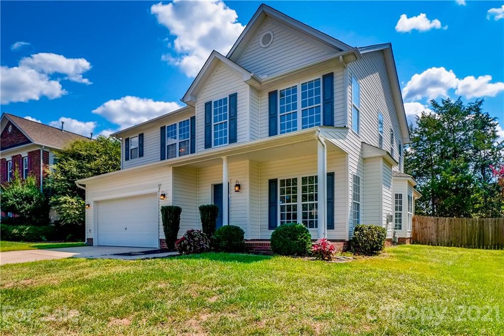4912 Missi Lane Fort Mill, SC 29708 - Photo 2 of 33 a view of a house with backyard and garden