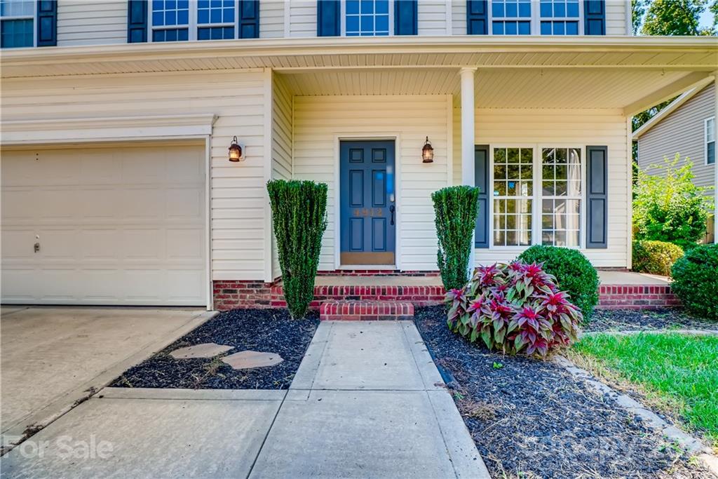 4912 Missi Lane Fort Mill, SC 29708 - Photo 3 of 33 a view of a house with potted plants