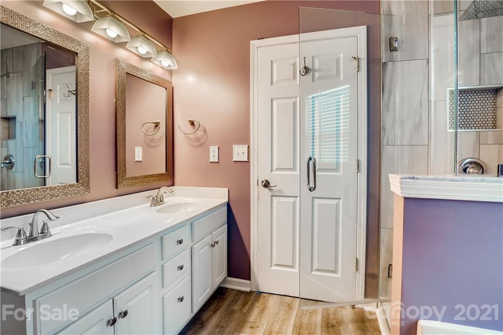 4912 Missi Lane Fort Mill, SC 29708 - Photo 24 of 33 a spacious bathroom with a double vanity sink mirror and