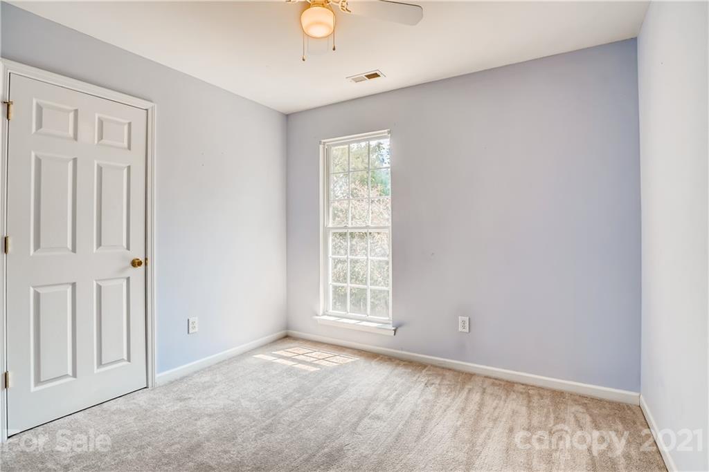 4912 Missi Lane Fort Mill, SC 29708 - Photo 25 of 33 an empty room with windows