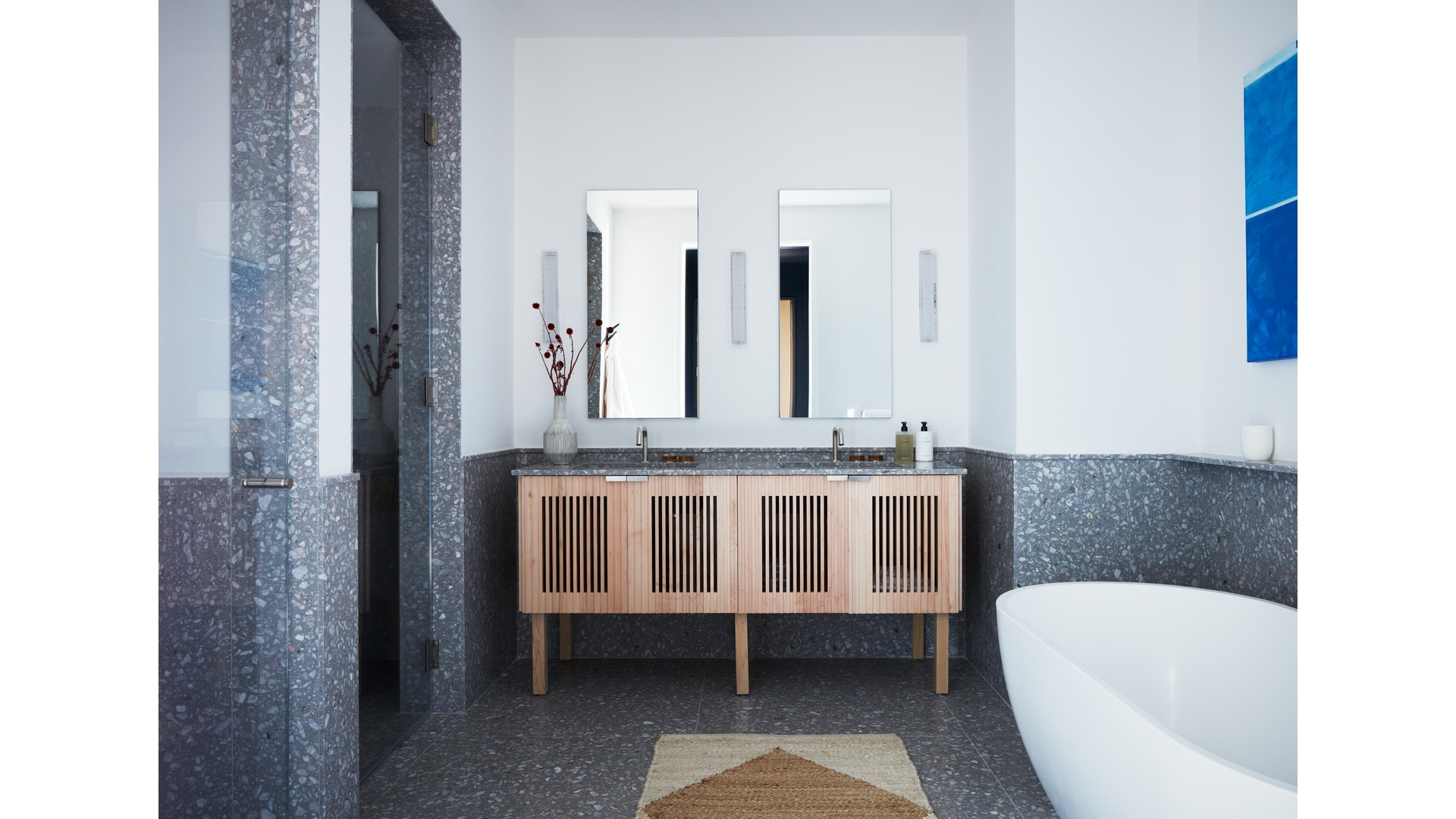 30 Front Street, Unit 19B Brooklyn, NY 11201 - Photo 8 of 36 a bathroom with a tub sink and mirror