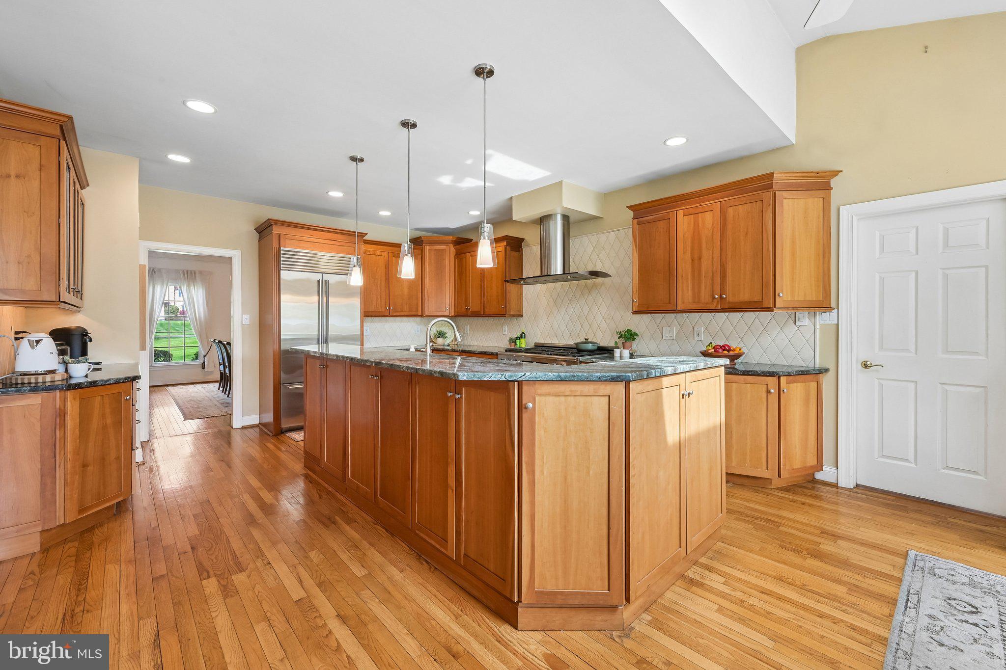 403 Providence Road Moorestown, NJ 08057 - Photo 19 of 39 Warm wood tones in a spacious kitchen.