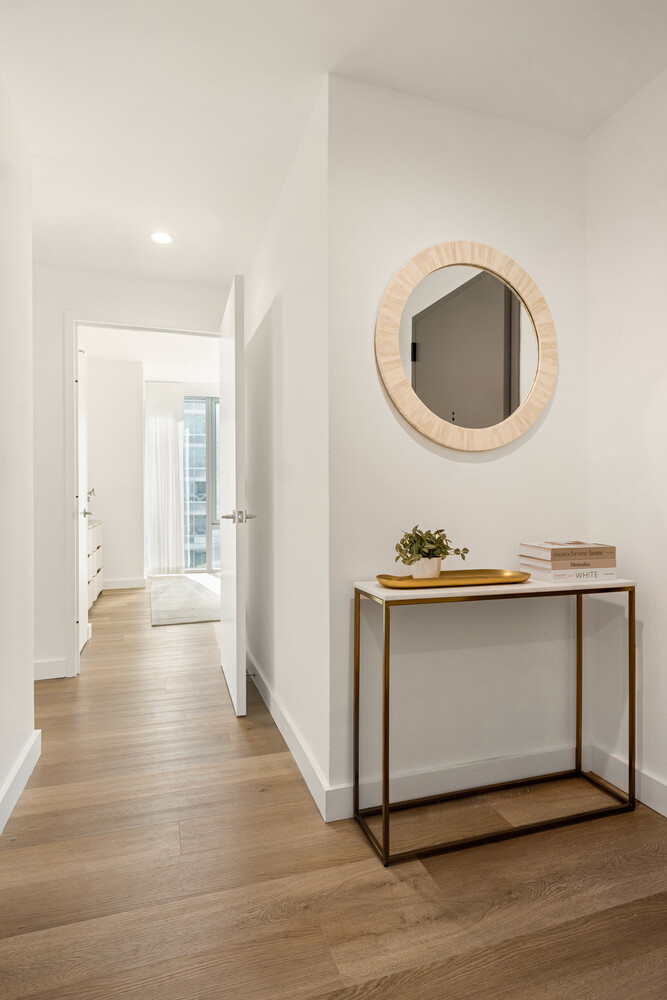89 DeKalb Avenue, Unit 5Q Brooklyn, NY 11201 - Photo 5 of 18 a view of living room with stainless steel appliances wooden floor and view living room