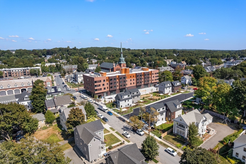 3 B Wilson Street, Unit 3B Natick, MA 01760 - Photo 31 of 33 an aerial view of a city with lots of residential buildings