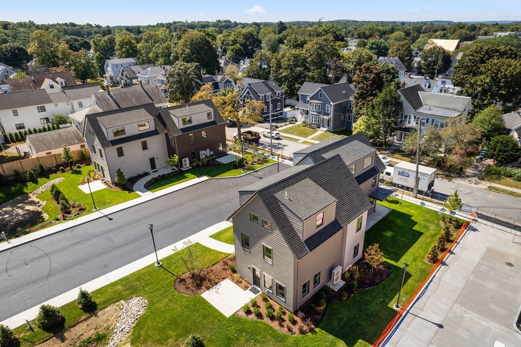 3 B Wilson Street, Unit 3B Natick, MA 01760 - Photo 4 of 33 an aerial view of a house with a garden