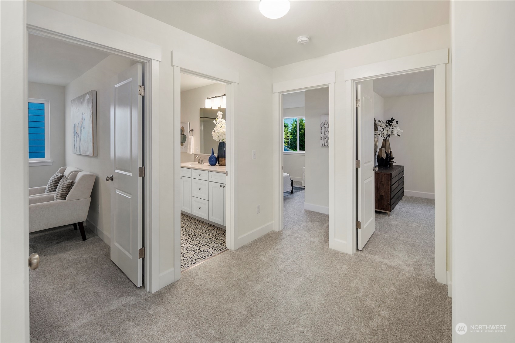 10969 Lot 8 Se 165th Street Renton, WA 98055 - Photo 17 of 38 a view of a hallway with furniture and a livingroom
