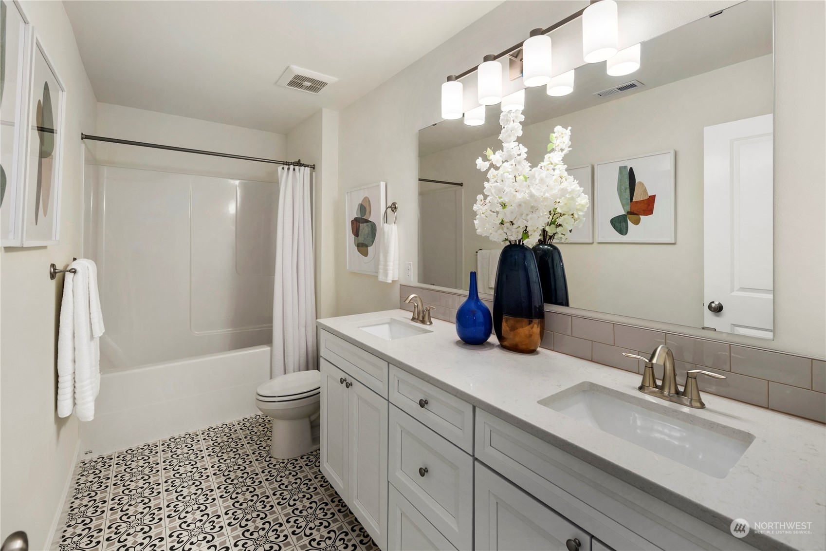 10969 Lot 8 Se 165th Street Renton, WA 98055 - Photo 18 of 38 a bathroom with a double vanity sink mirror and shower