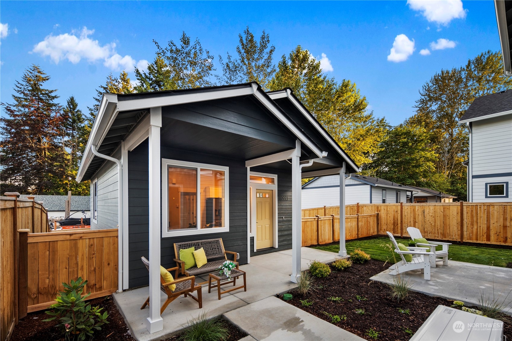10969 Lot 8 Se 165th Street Renton, WA 98055 - Photo 27 of 38 a backyard of a house with seating space