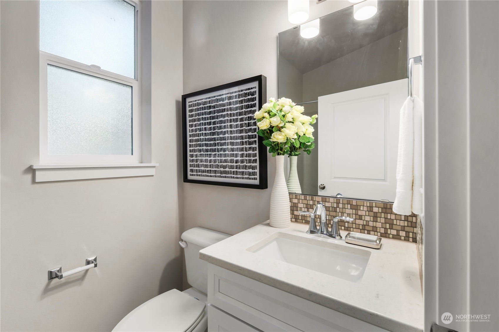 10969 Lot 8 Se 165th Street Renton, WA 98055 - Photo 34 of 38 a bathroom with a sink toilet and mirror