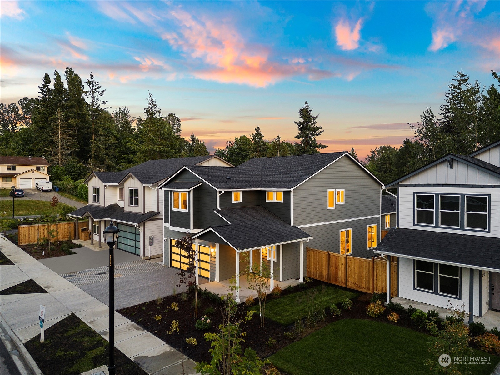 10969 Lot 8 Se 165th Street Renton, WA 98055 - Photo 36 of 38 a front view of a house with garden