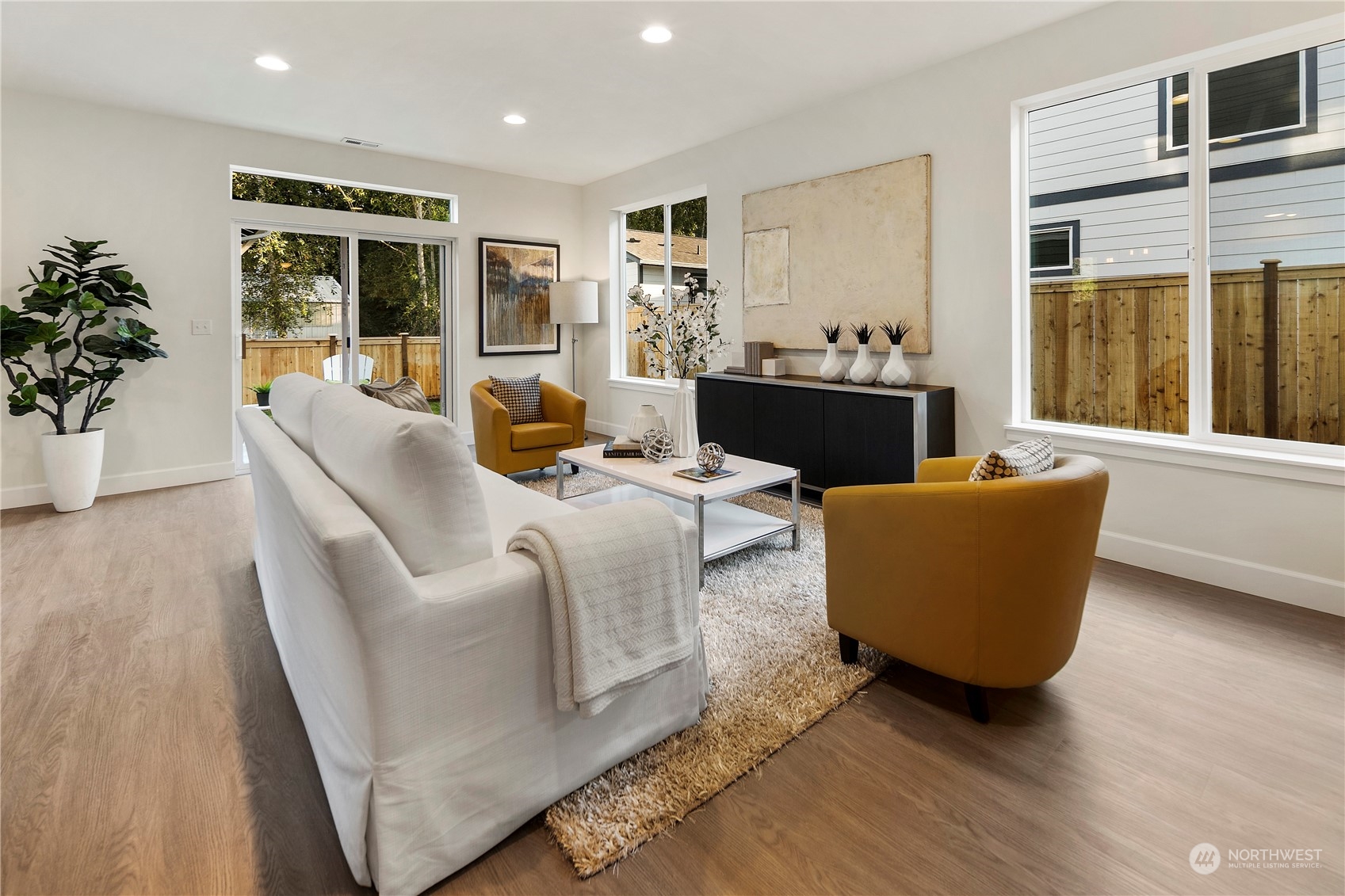 10969 Lot 8 Se 165th Street Renton, WA 98055 - Photo 5 of 38 a living room with furniture and large windows
