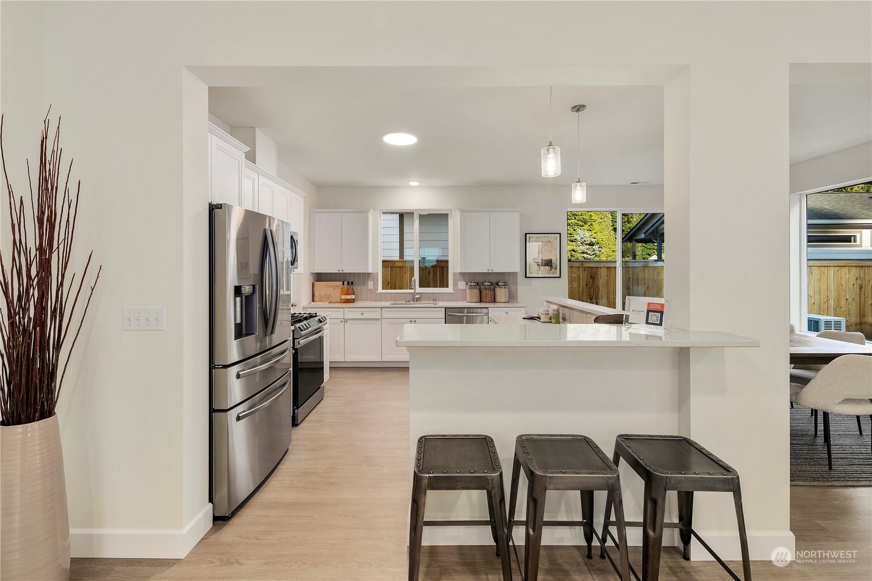 10969 Lot 8 Se 165th Street Renton, WA 98055 - Photo 8 of 38 a kitchen with refrigerator and cabinets