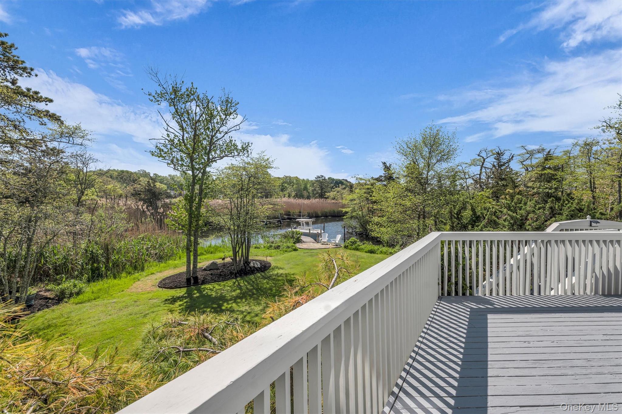 238 Beaver Dam Road Brookhaven, NY 11719 - Photo 33 of 44 a view of balcony and yard