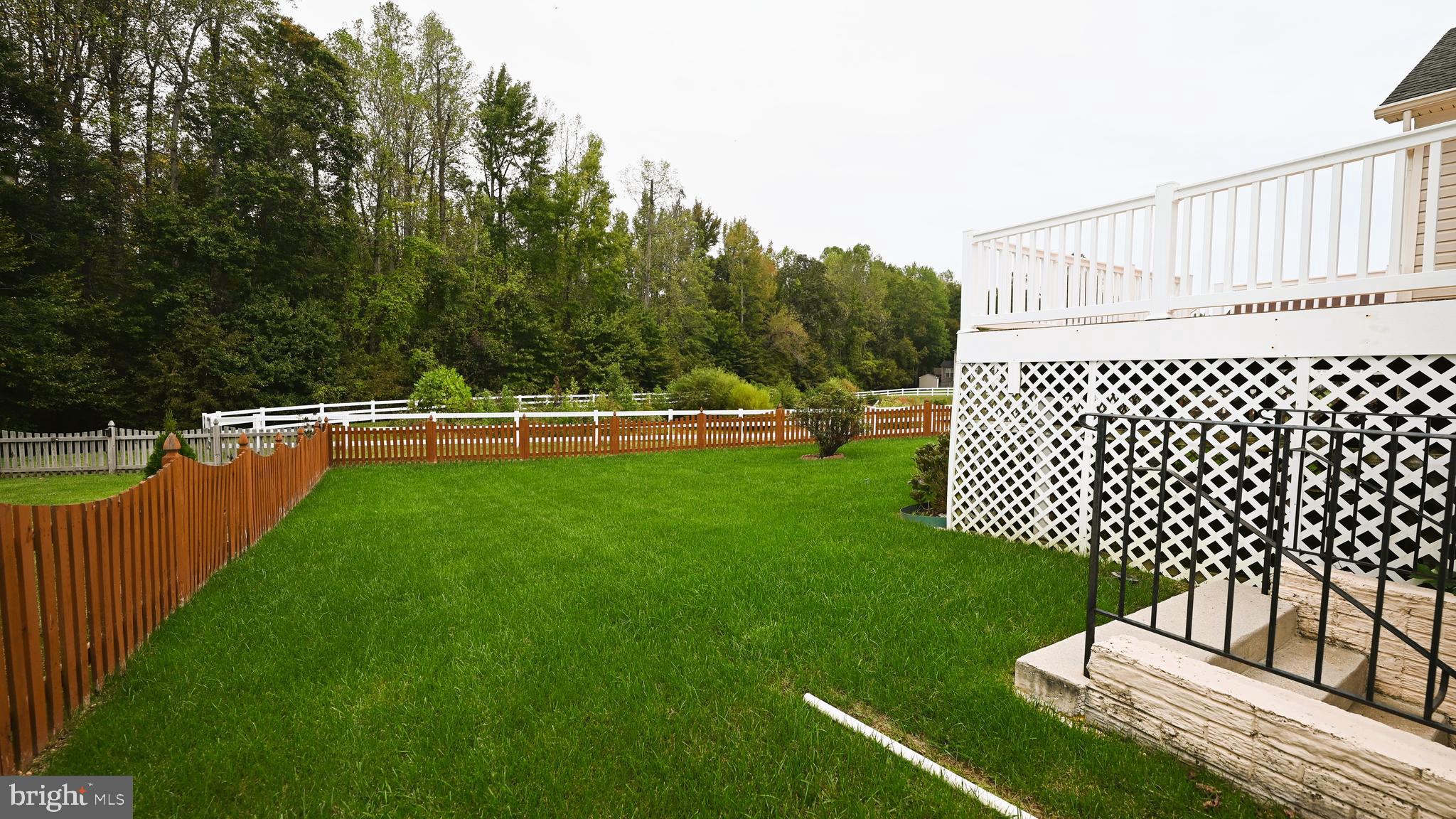 11258 Wildmeadows Street Waldorf, MD 20601 - Photo 32 of 33 a view of a deck with a bench