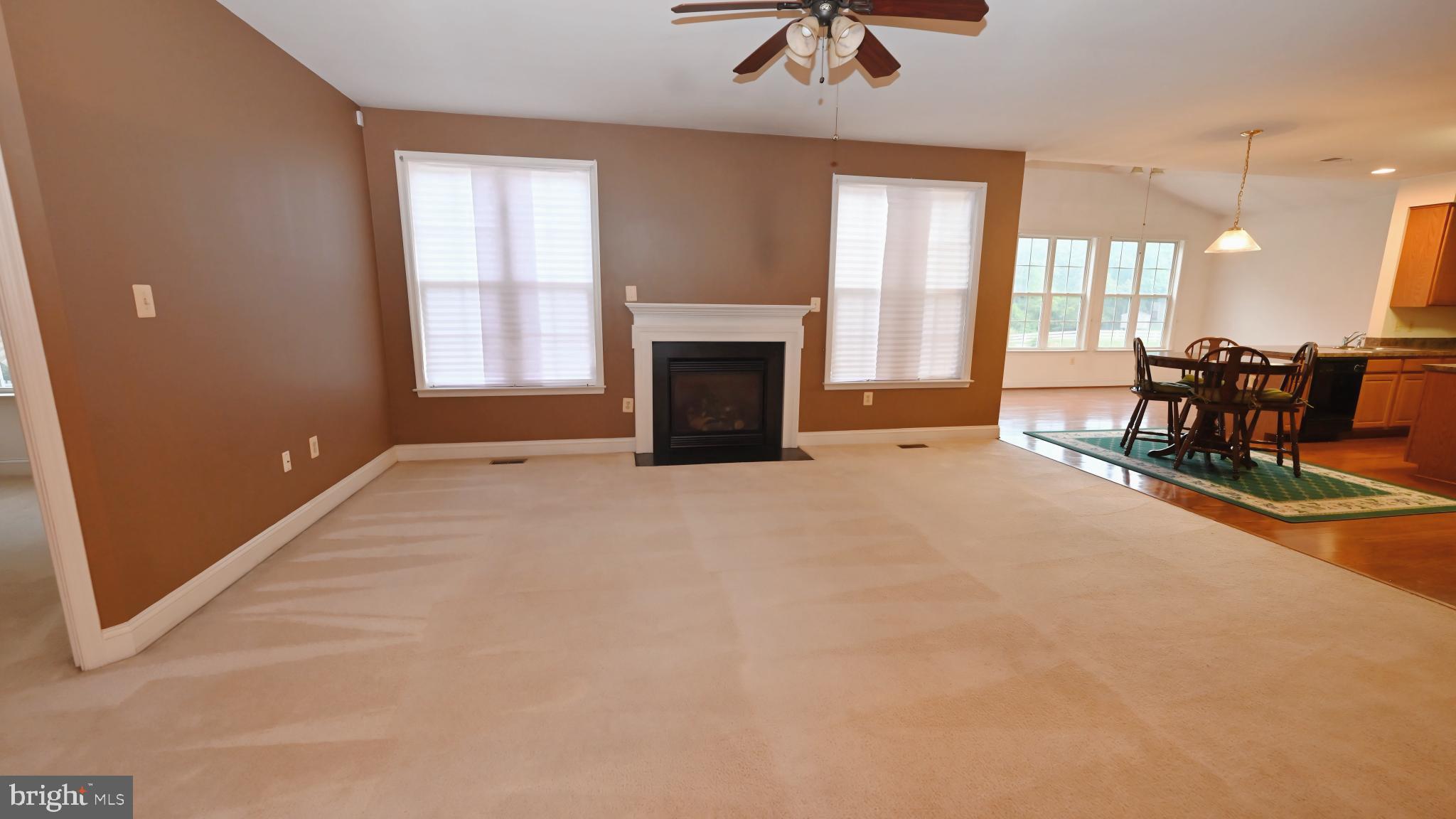 11258 Wildmeadows Street Waldorf, MD 20601 - Photo 8 of 33 an empty room with furniture and chandelier fan