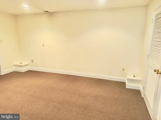 a view of a room with an empty space
