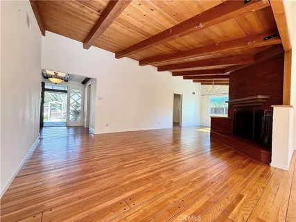 a kitchen with stainless steel appliances granite countertop a sink and a stove