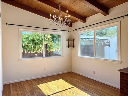 a kitchen with a sink and a large window