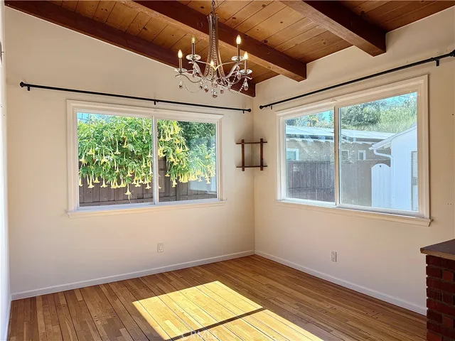 a kitchen with a sink and a large window