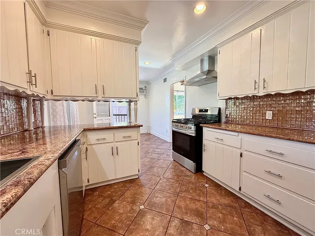 a view of gallery with wooden floor