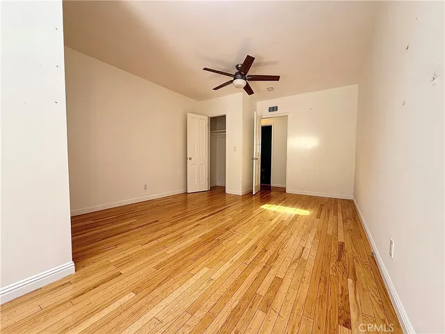 a bathroom with a shower sink and mirror