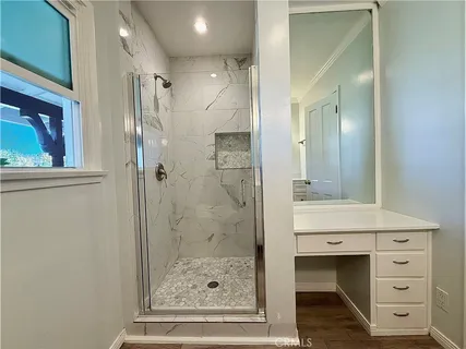 a view of a room that has a window