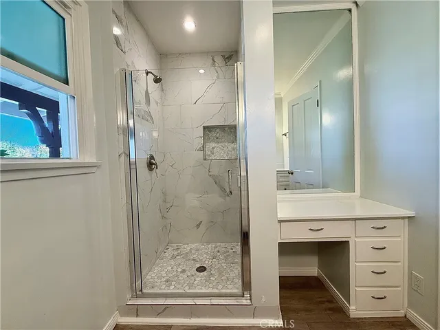 a view of a room that has a window