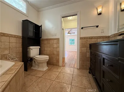 a view of a chairs and table in the patio