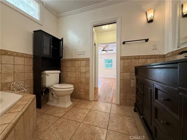 a view of a chairs and table in the patio