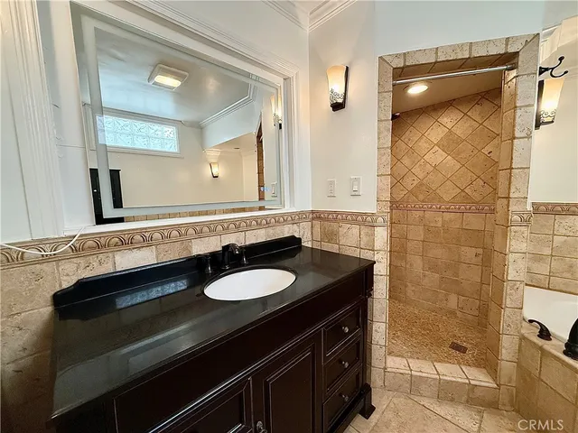 a view of a backyard with sitting area