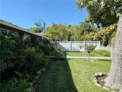 a view of a garden with flowers