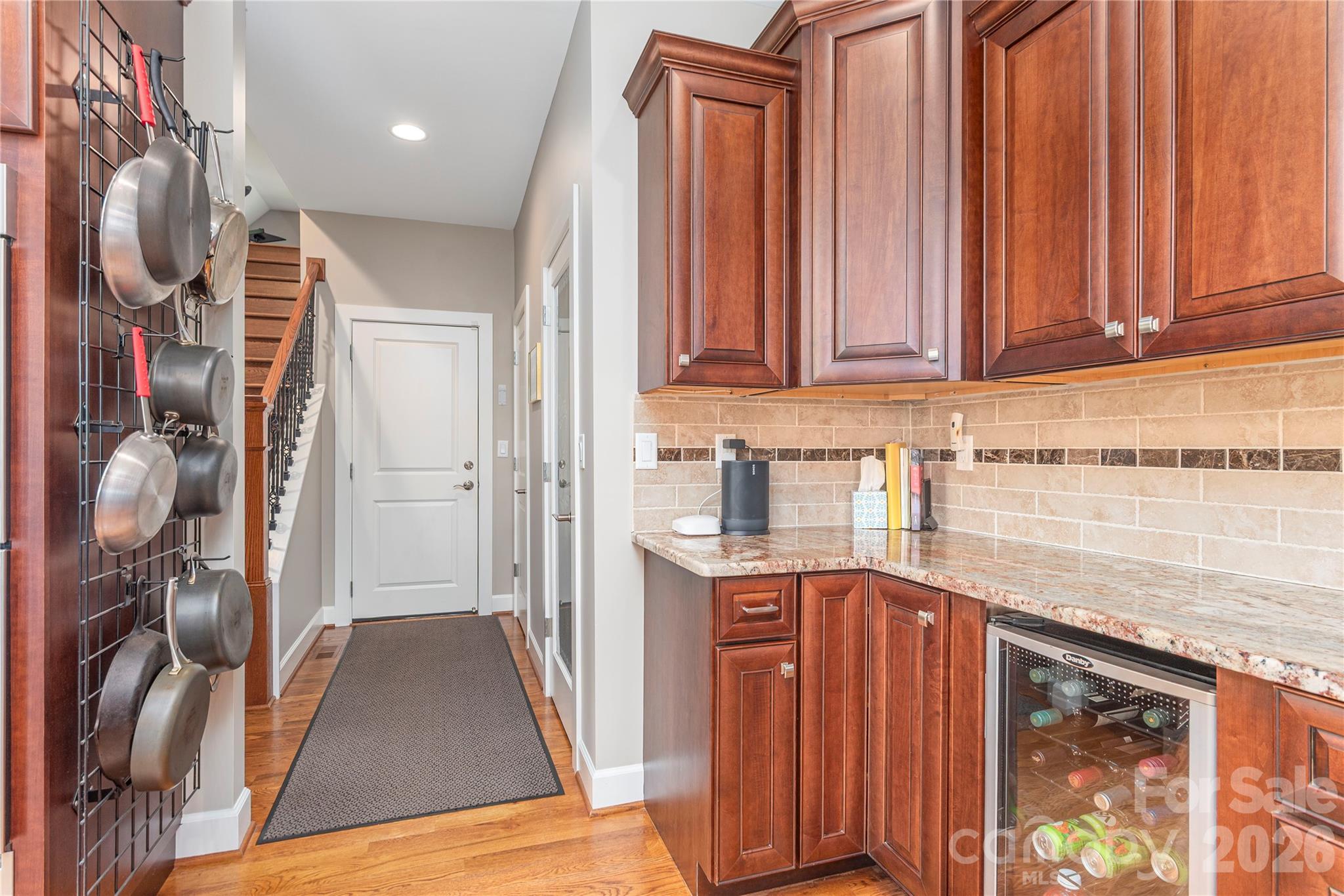 930 Big Raven Lane Saluda, NC 28773 - Photo 16 of 35 a kitchen with stainless steel appliances granite countertop a refrigerator and a stove