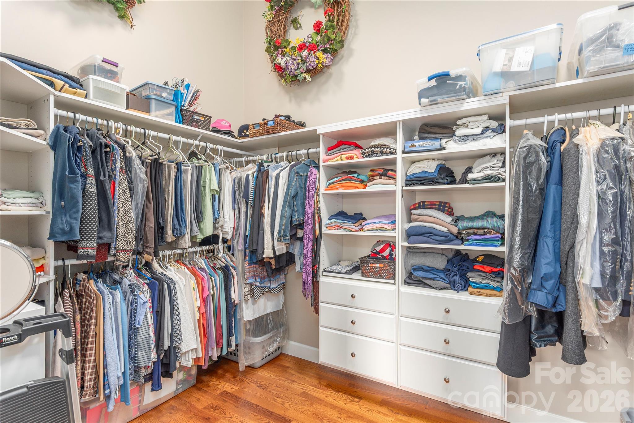 930 Big Raven Lane Saluda, NC 28773 - Photo 23 of 35 a view of walk in closet with clothes and shoes