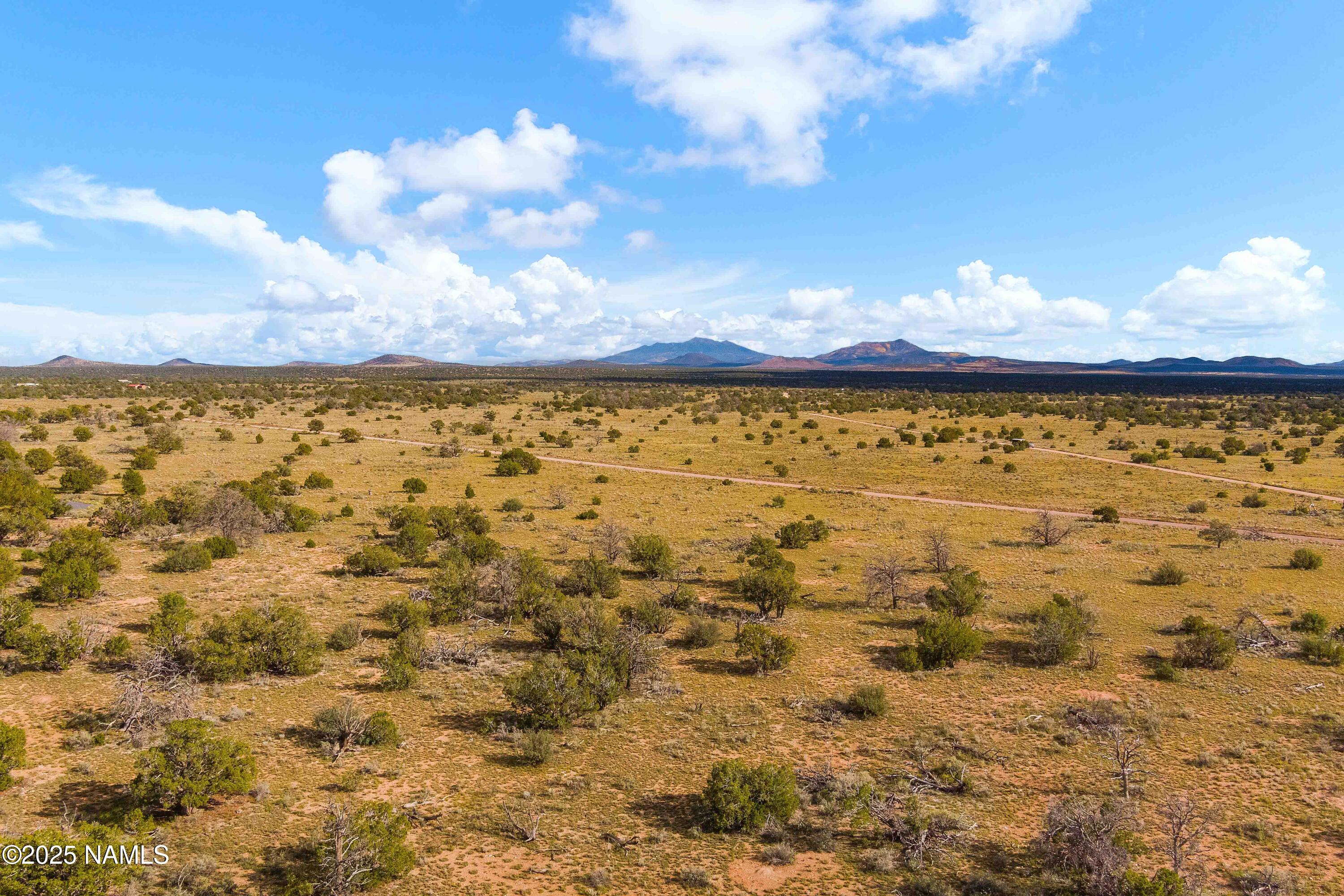 3697 East S Rim Ranch Road, Unit A Williams, AZ 86046 - Photo 21 of 47 a view of lake from yard