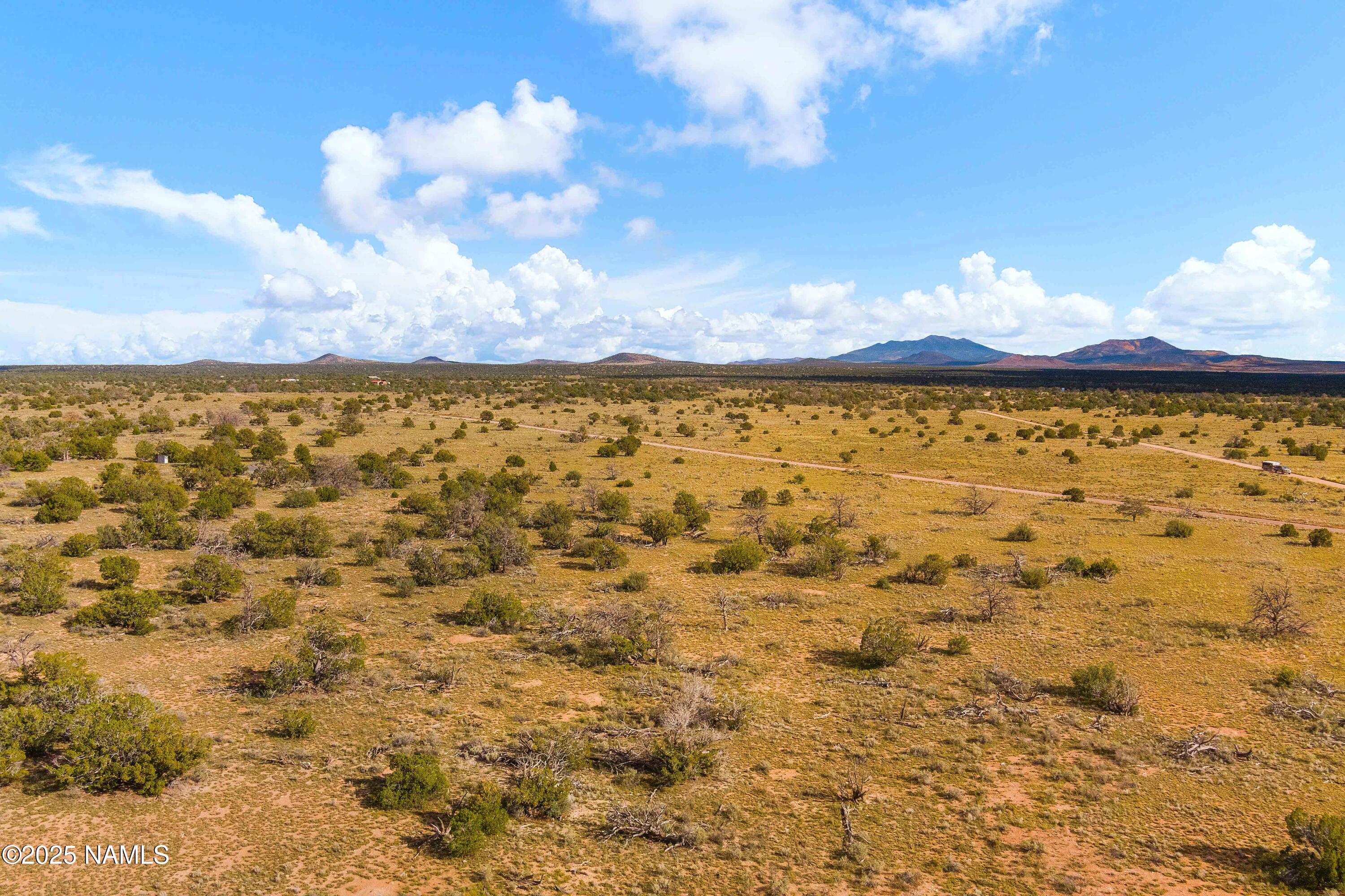 3697 East S Rim Ranch Road, Unit A Williams, AZ 86046 - Photo 22 of 47 a view of a sky from a lake