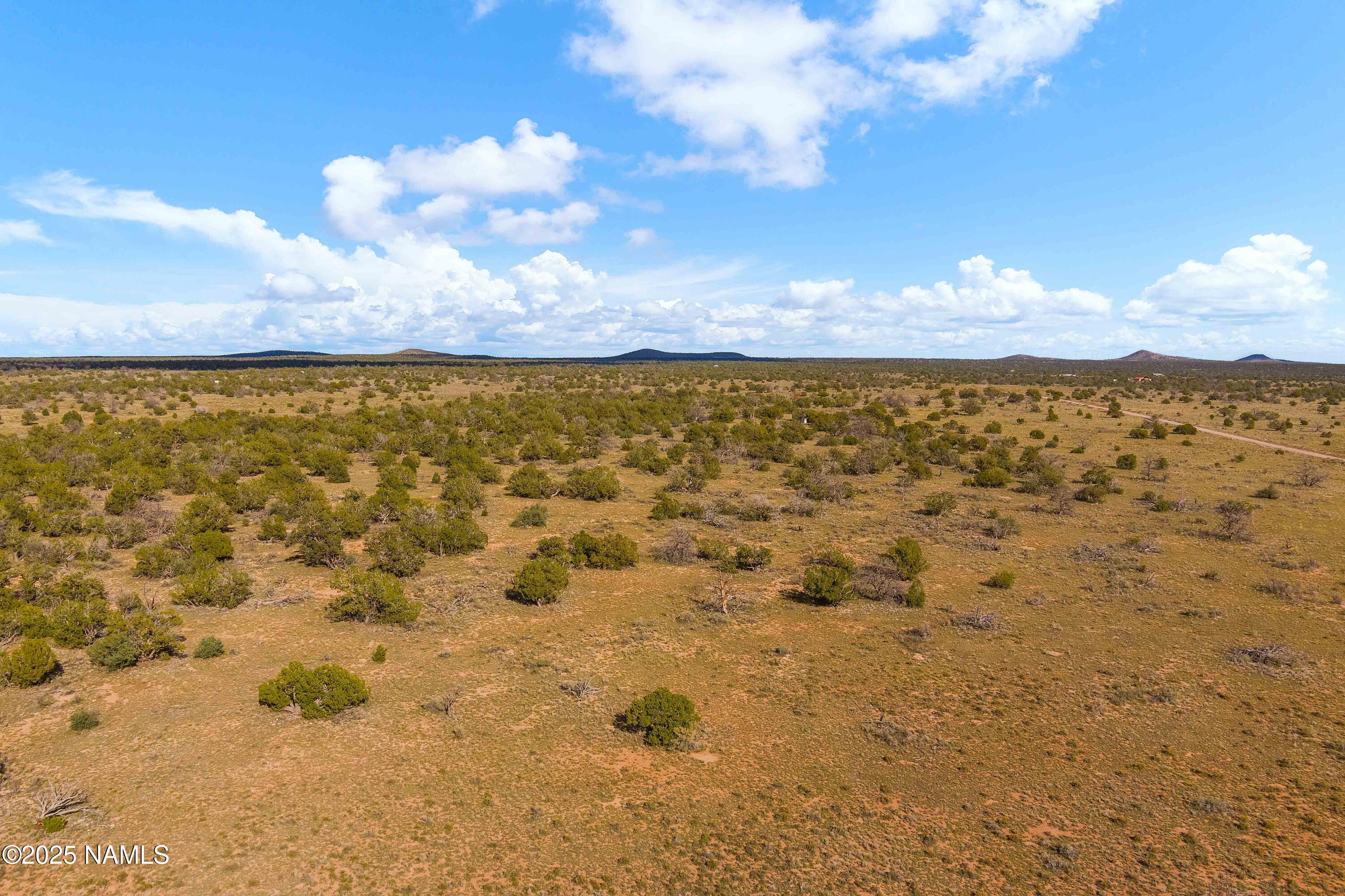 3697 East S Rim Ranch Road, Unit A Williams, AZ 86046 - Photo 25 of 47 a view of city and ocean