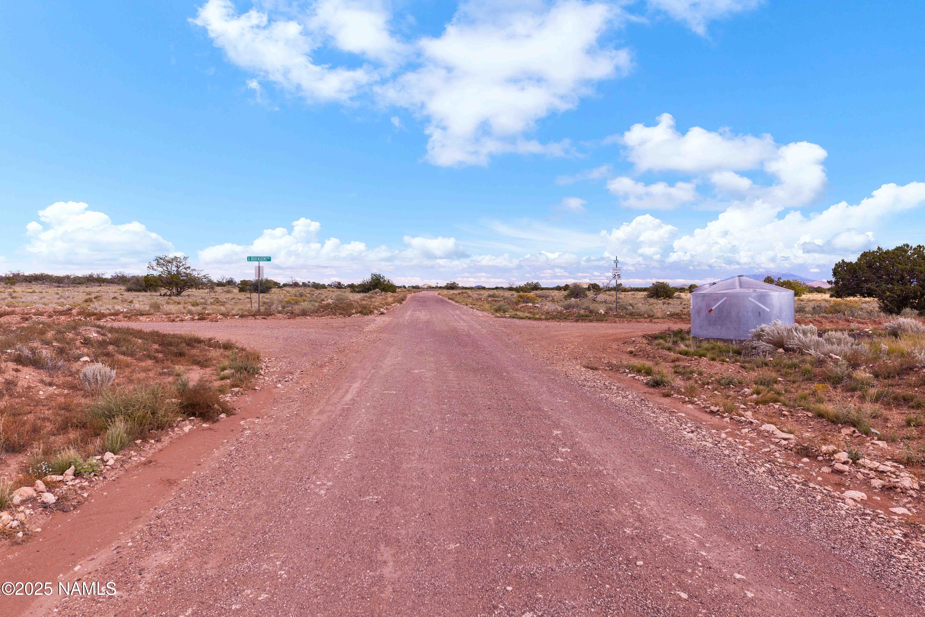 3697 East S Rim Ranch Road, Unit A Williams, AZ 86046 - Photo 44 of 47 a view of a lake with houses in the back