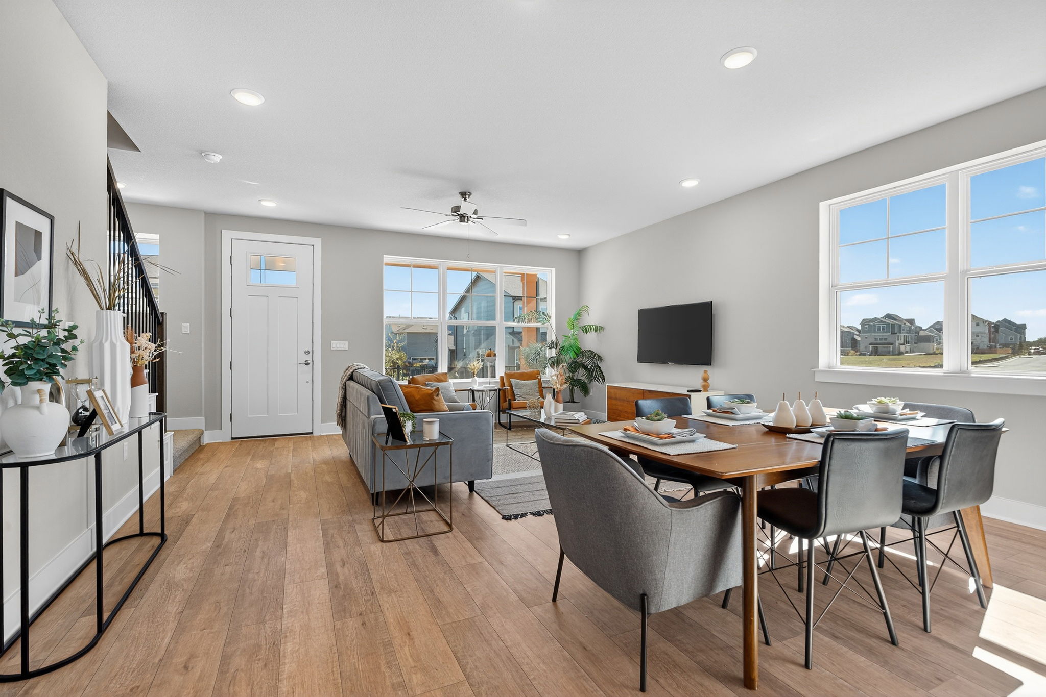 5904 Rotunda View Austin, TX 78747 - Photo 2 of 37 Dining space featuring light wood finished floors, recessed lighting, stairs, and ceiling fan