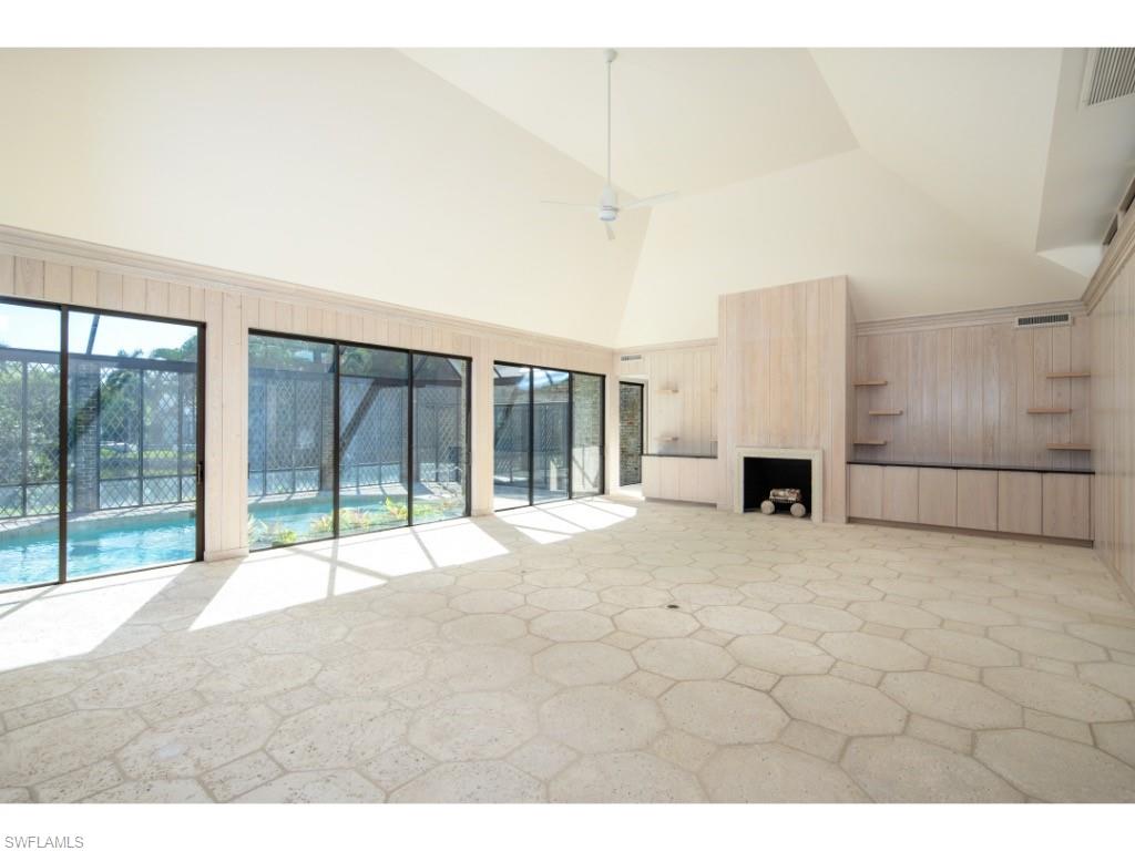 2610 Half Moon Walk Naples, FL 34102 - Photo 2 of 10 a view of a house with a large window