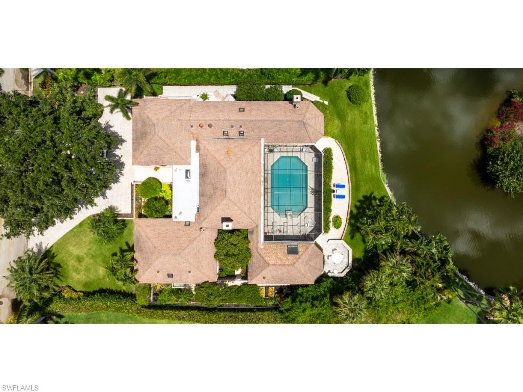 2610 Half Moon Walk Naples, FL 34102 - Photo 10 of 10 an aerial view of a house with garden space and street view