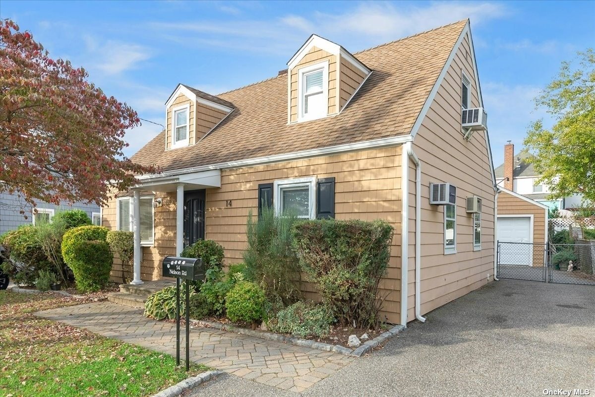 14 Nelson Road Valley Stream, NY 11581 - Photo 1 of 1 a view of a house with a yard